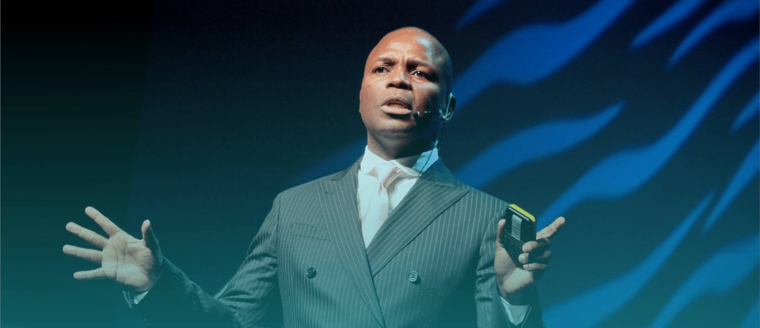 Thebe Ikalafeng delivering a keynote on stage